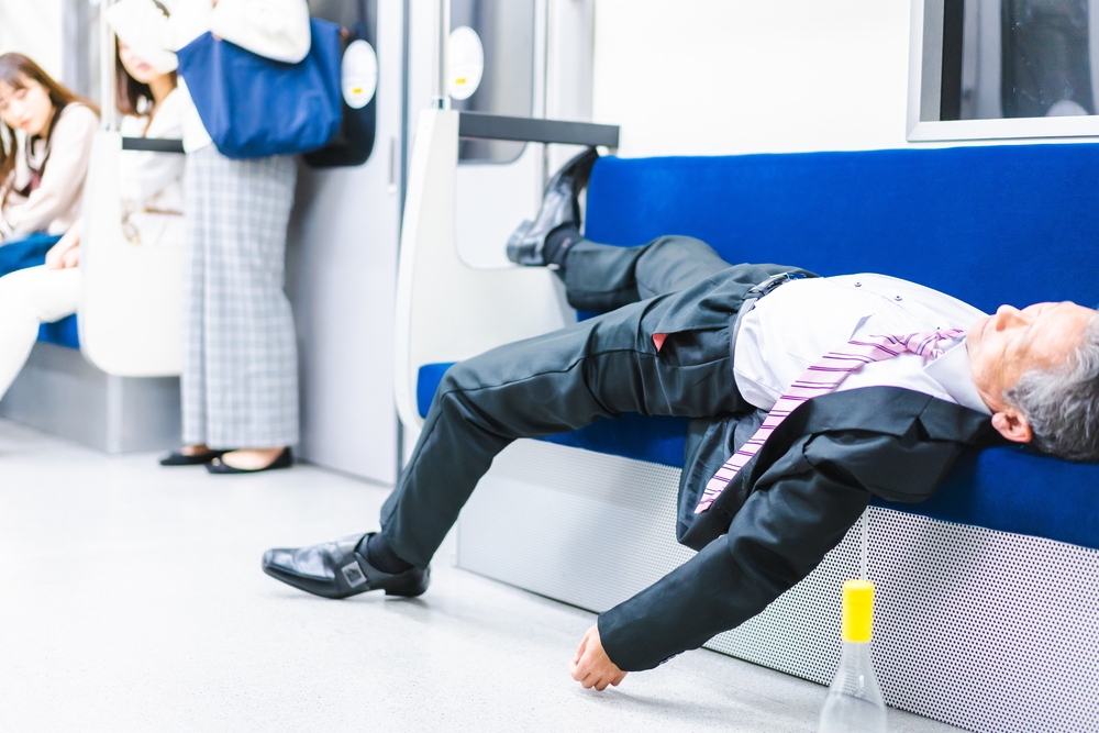 A man publicly intoxicated on a train in Texas, passed out. Learn how serious a public intoxication charge is in Texas from a skilled criminal defense firm.