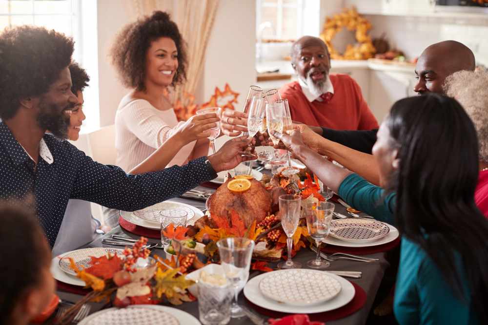 A minor toasting with their family during Thanksgiving. Find out if it is legal for a minor to drink with their parents present in Texas.